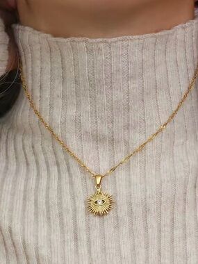 Gold Sunburst Pendant Necklace with Clear Crystal
